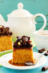 Caramel cake with chocolate decoration.