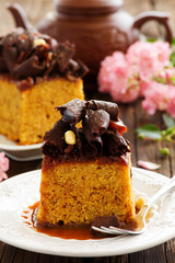 Caramel cake with chocolate decoration.