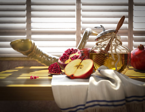 Honey jar with apples and pomegranate for  Rosh Hashana religious holiday