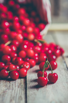 Cherries on wooden background