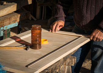 Handcrafted wooden door in carpentry.