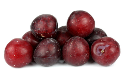 Red plum fruit isolated on white background.