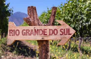 Rio Grande do Sul wooden sign with vineyard background