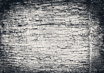 Obraz premium Wooden texture of black color with scratches and cracks, which can be used as a background