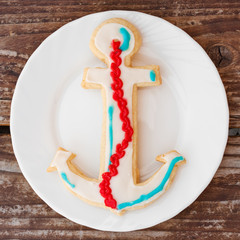 Cookies as anchors on plate, top view