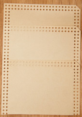 brown paper on a wooden background