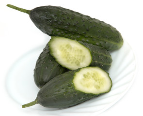 Fresh cucumbers on a white background