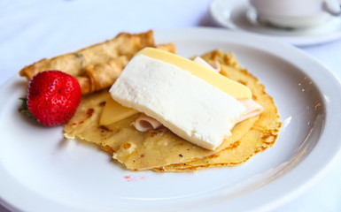 Pancake with cheese and ham