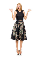 Fototapeta premium Woman in floral dark skirt isolated on white