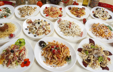 Variety of prepared pasta served on the table.