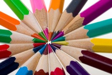 Fototapeta premium thick colored pencils against a white background color
