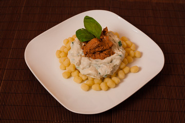 Gnocchi and spinach.