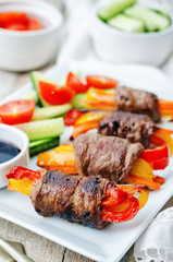 beef stuffed peppers, carrots and onions with balsamic dressing