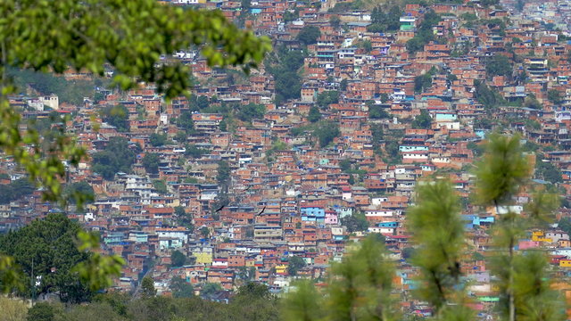 View of a shanty town residential district in Caracas City, Venezuela. Poorness is a main factor for drug dealing and crime in these places and a common factor in developing counties.