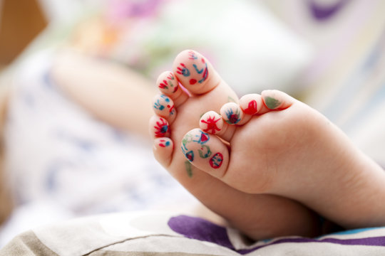 Painted childrens fingers feet