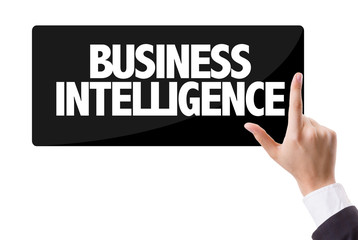 Businessman pressing button with the text: Business Intelligence