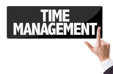 Businessman pressing button with the text: Time Management 