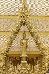 Golden Buddha in standing with frame