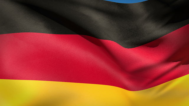 German and European nationals flags in the wind