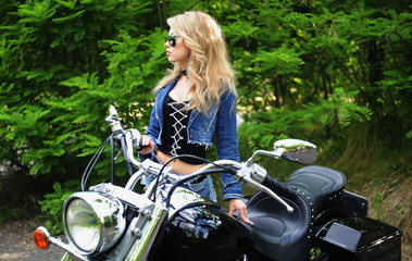 Fototapeta na wymiar Young beautiful woman and bike 