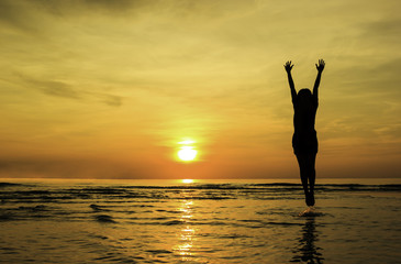 Silhouette Happy Girl jump show hand