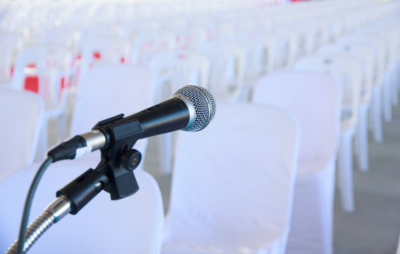 Stock Photo - Close up of microphone in conference room
