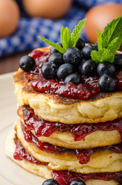 Glutten-free pancakes with jam and blueberries