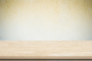 Empty wooden table over grunge cement wall, vintage, background, template, display