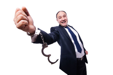 Businessman handcuffed isolated on white