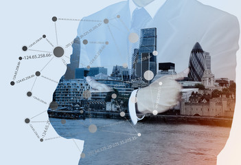 Double exposure of businessman working with new modern computer