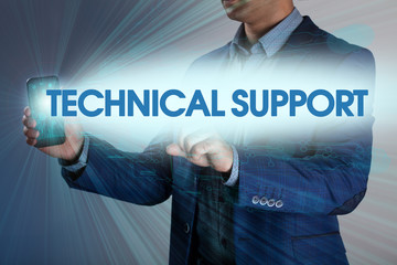 Businessman presses button technical support on virtual screens.