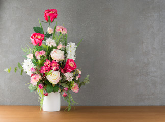 plastic rose in vase