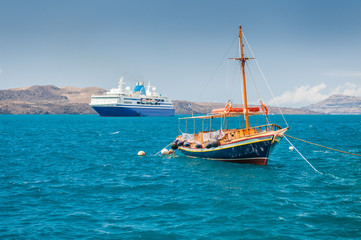 Tourist ships on the sea coast.