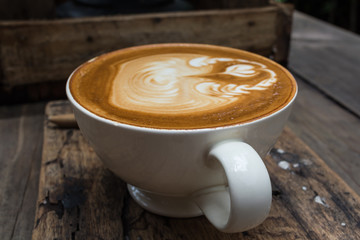 Coffee art on wooden table