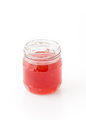 strawberry jam bottle on white background
