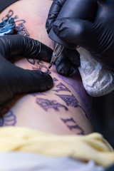 Girl Getting Tattoo
