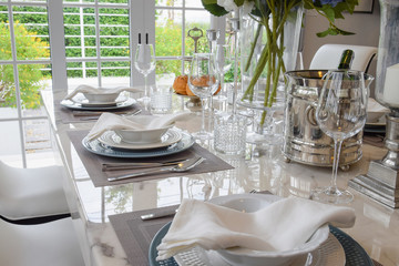 elegant table set in vintage style dining room interior