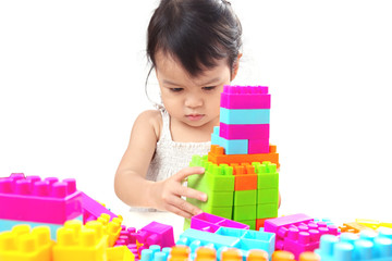 Asian Baby Girl, Toddler, Playing Colorful Blocks Isolated on White Background.