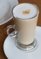 hot coffee on wood table
