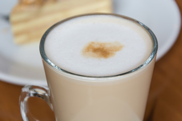 hot coffee on wood table