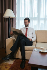 Businessman with newspaper