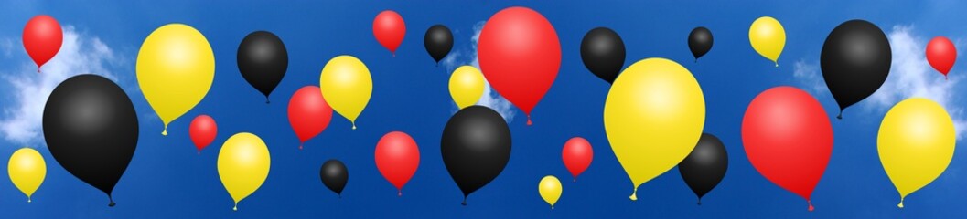 Banner Red, yellow, black balloons on blue sky