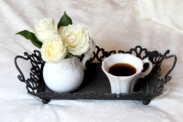 A cup of coffee in bed