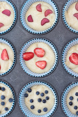 A tray of raw muffins. Ready for insertion into the oven.