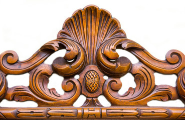 Ornament carved in wood on white background
