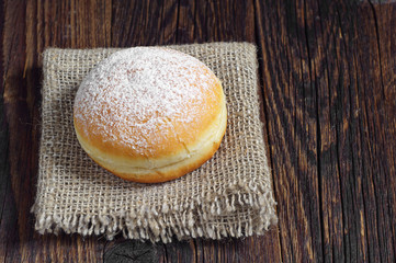 Sweet donut on table