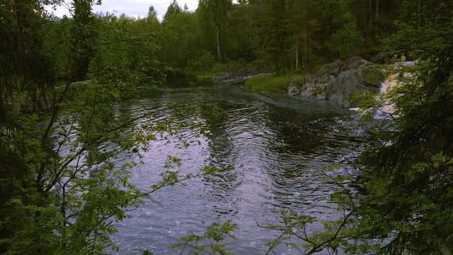 Mountain lake with small falls