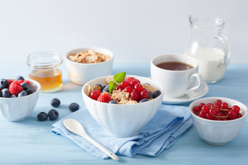 healthy breakfast with cornflakes and berry