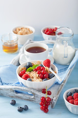 healthy breakfast with cornflakes and berry