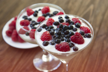 yogurt dessert with raspberries and blueberries